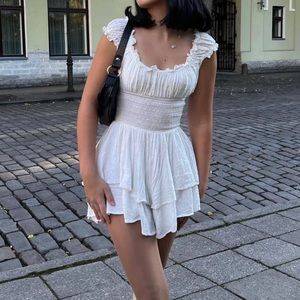 The love galore romper white. White princess Polly romper